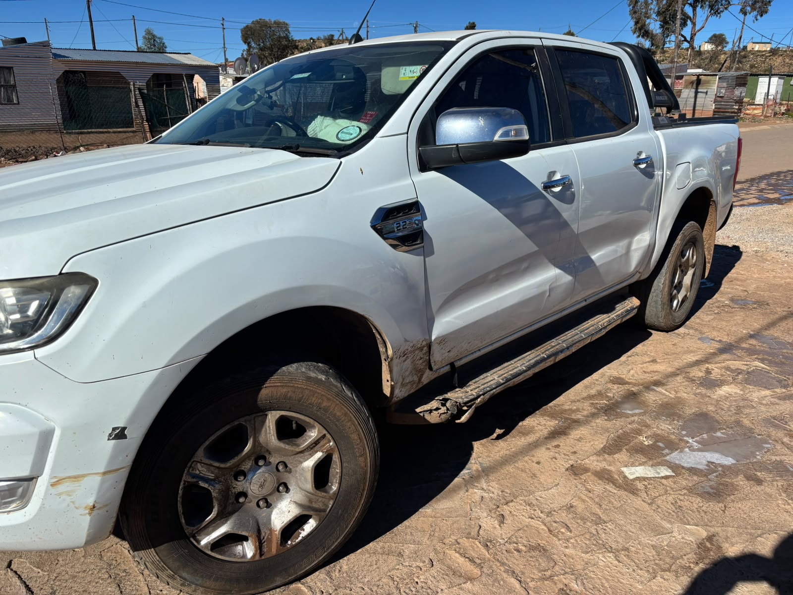 White Ford Ranger double cab with side impact damage